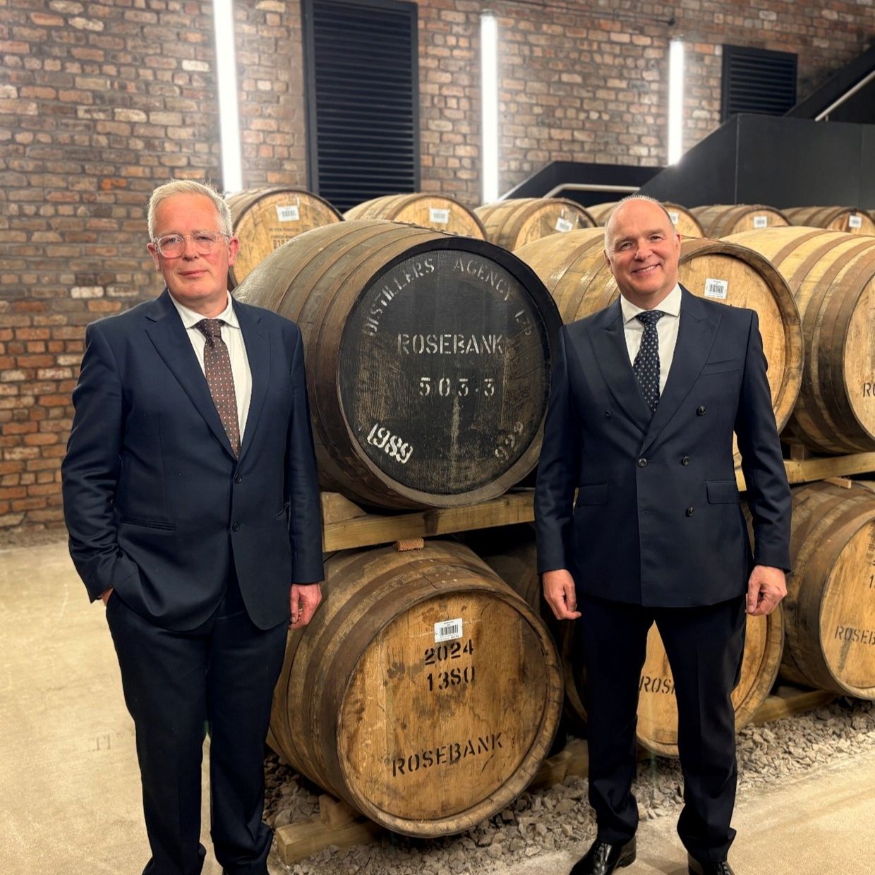 Ian Macleod Private Clients team beside stacked Rosebank casks, including a 1989 Distillers Agency cask, 2026