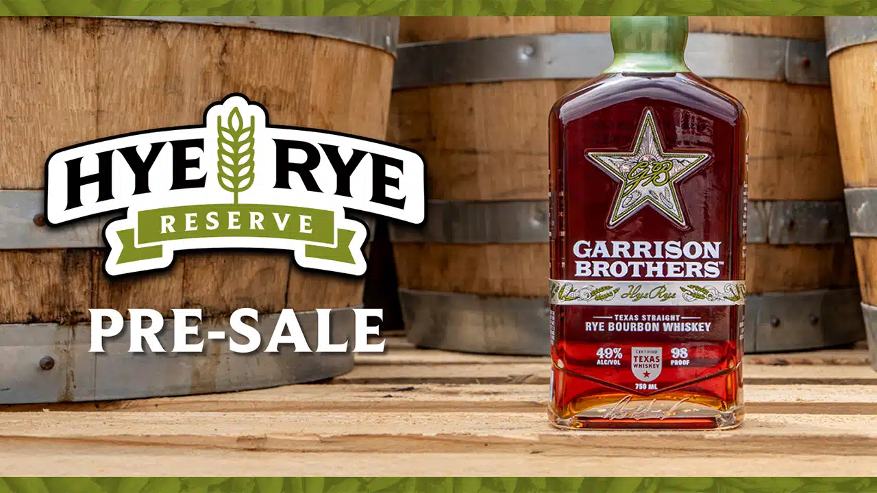 Garrison Brothers Hye Rye Reserve bottle in front of bourbon barrels, 2026 pre-sale announcement, Hye, Texas