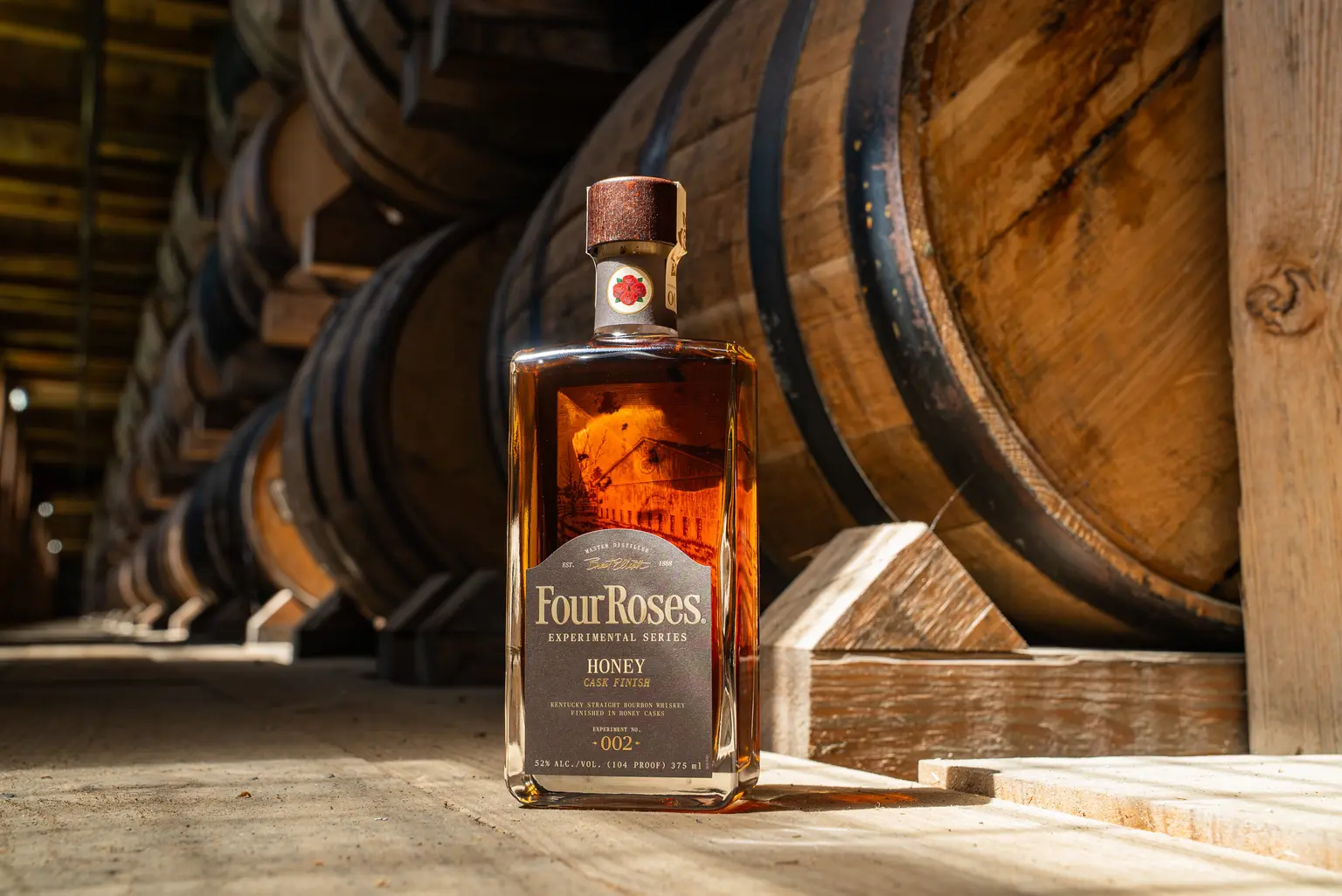 Four Roses Honey Cask Finish 375ml bottle in the distillery rickhouse, Experimental Series No. 002, 2026