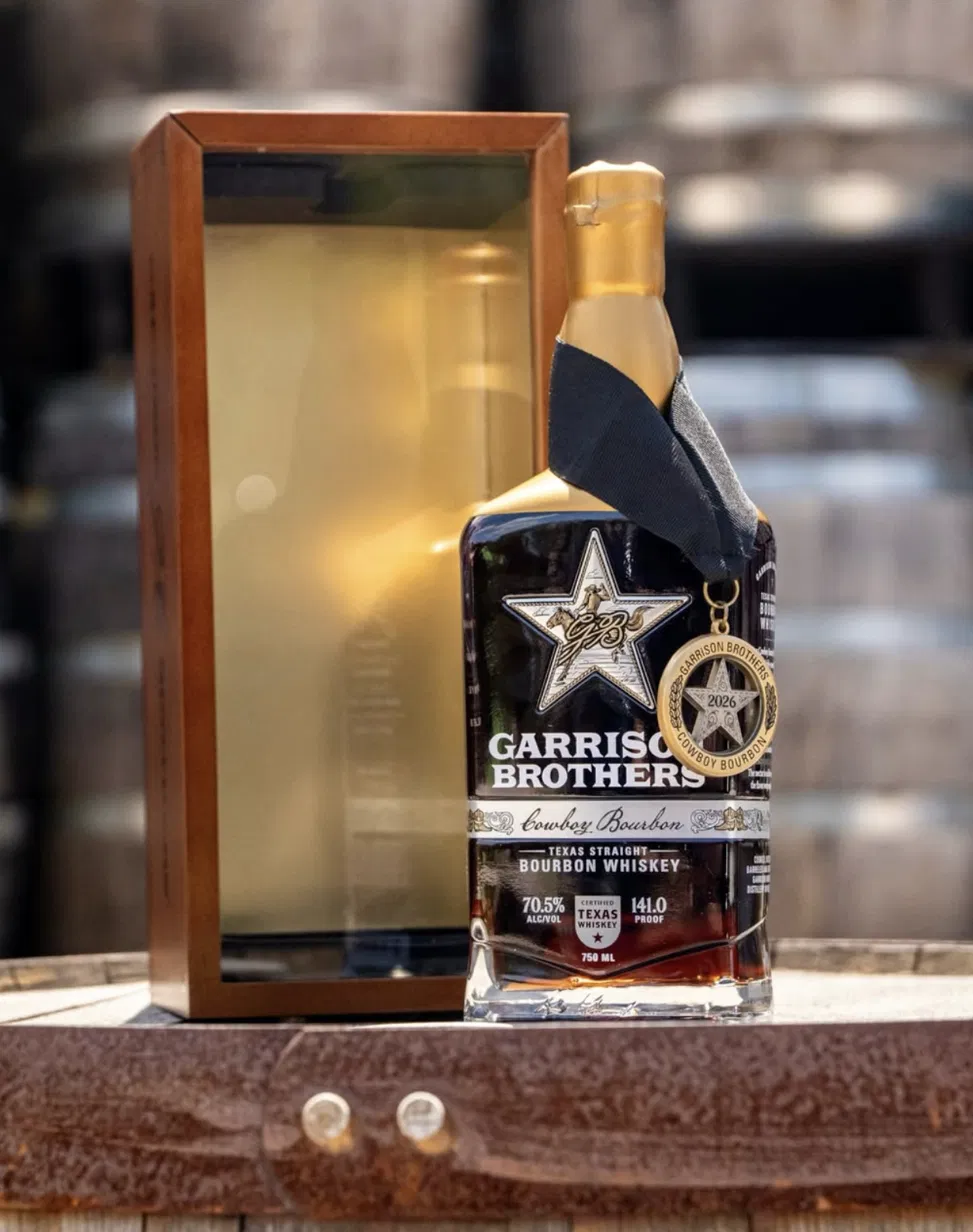 Garrison Brothers 2026 Cowboy Bourbon 750ml bottle with wooden display case, Texas straight bourbon whiskey