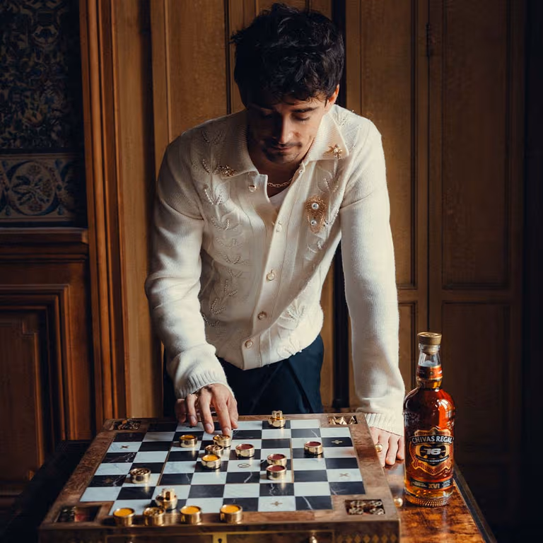 Charles Leclerc playing SE!ZE chess-inspired strategy game at the Chivas Regal Arena of Mastery, Monza 2026